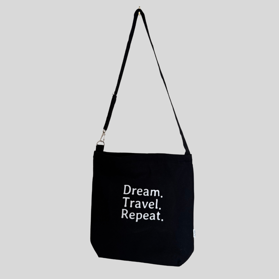 Black travel quote tote bag - Dream. Travel. Repeat.